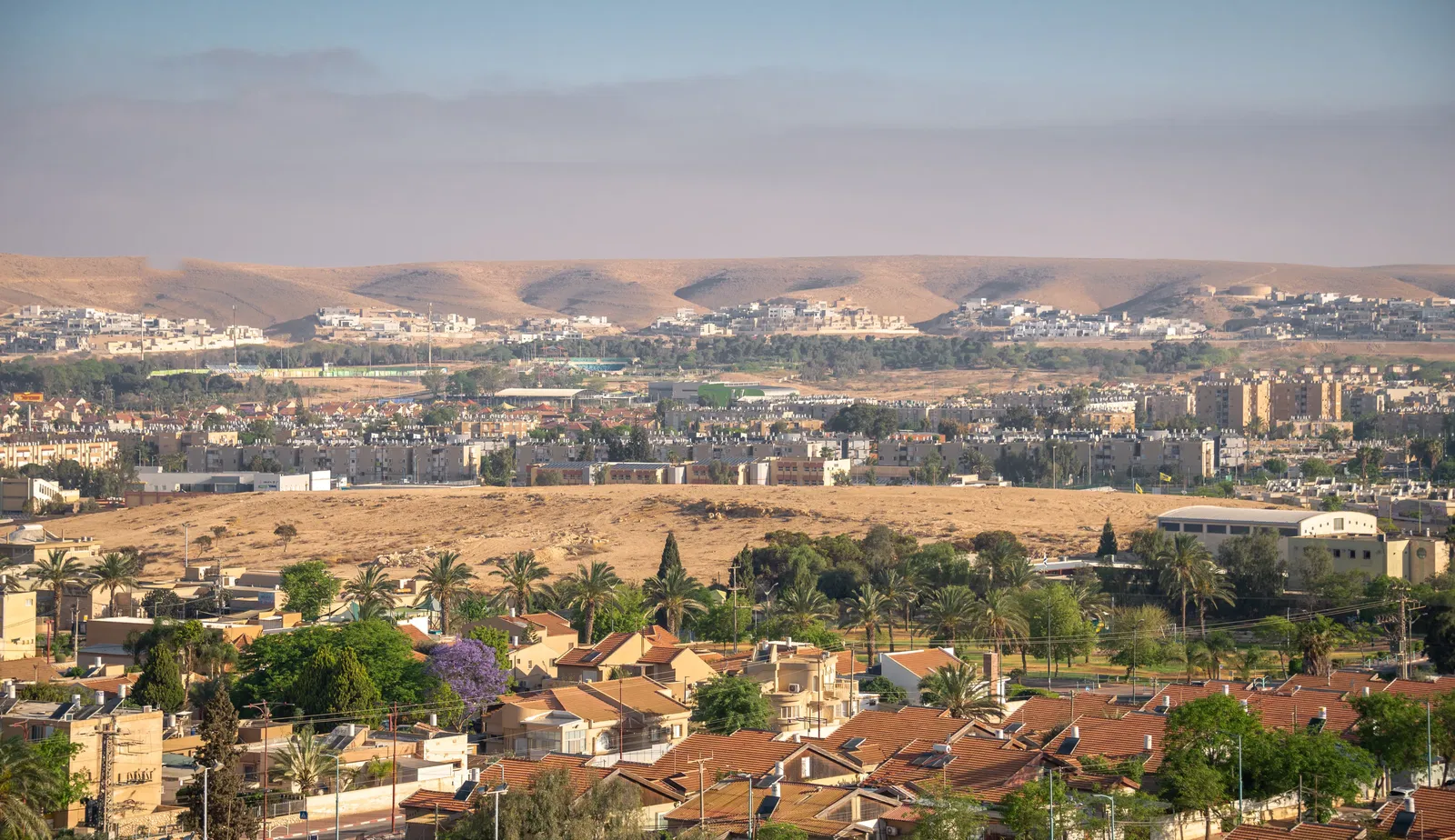 A photograph of Dimona taking from atop a hill.